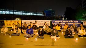 Image for article Kerzenmahnwache vor der chinesischen Botschaft in Berlin